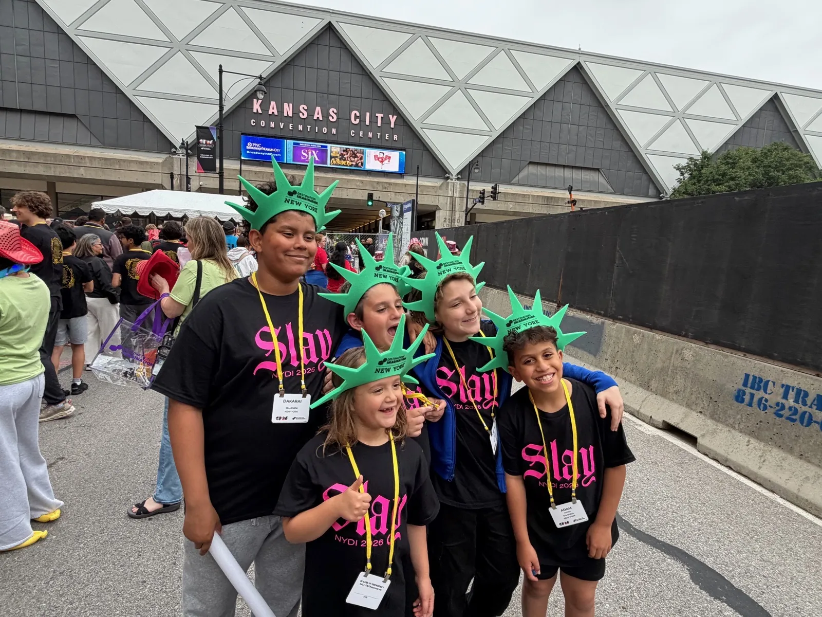 Fig. 11 — The team in their New York affiliate shirts and Liberty crowns outside the convention center
